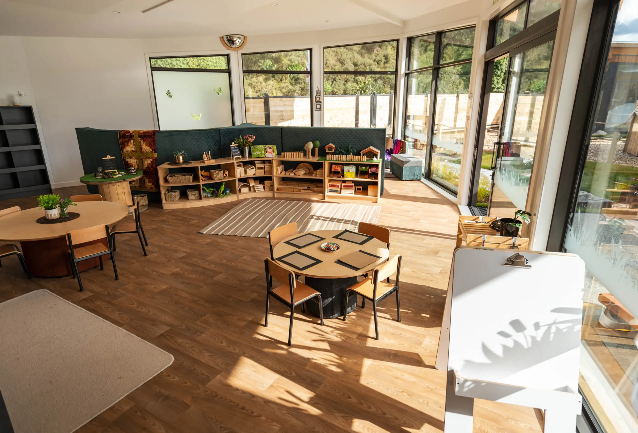 Light-filled HomePod with wooden play furniture